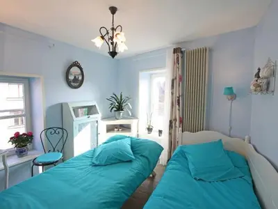 Un ou plusieurs lits dans un hébergement de l'établissement Appartement Confortable à Remiremont, Proche Centre et Commerces, Garage et Wifi Inclus - FR-1-589-132