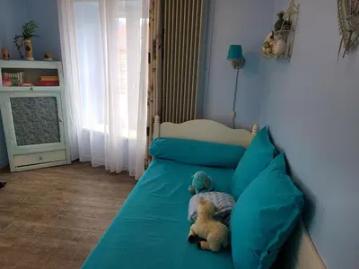 Coin salon dans l'établissement Appartement Confortable à Remiremont, Proche Centre et Commerces, Garage et Wifi Inclus - FR-1-589-132