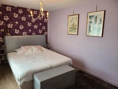 Un ou plusieurs lits dans un hébergement de l'établissement Appartement Confortable à Remiremont, Proche Centre et Commerces, Garage et Wifi Inclus - FR-1-589-132