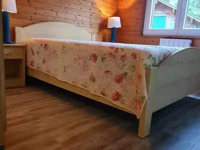 Un ou plusieurs lits dans un hébergement de l'établissement Chalet Confortable à La Bresse, Proche Ski, Wifi, Animaux Acceptés - FR-1-589-130