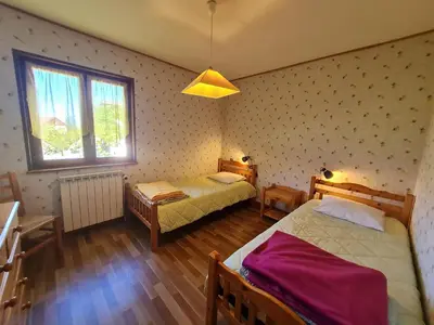 Un ou plusieurs lits dans un hébergement de l'établissement Maison tranquille avec cheminée près de Gérardmer - FR-1-589-142