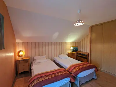 Un ou plusieurs lits dans un hébergement de l'établissement Gîte Alsace proche forêts, randonnée, stations de ski, 2 salons, terrasse sud, cheminée, animaux acceptés - FR-1-589-200