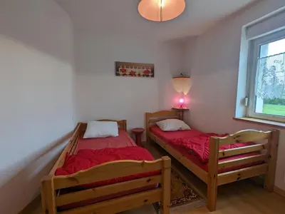 Un ou plusieurs lits dans un hébergement de l'établissement Gîte Alsace proche forêts, randonnée, stations de ski, 2 salons, terrasse sud, cheminée, animaux acceptés - FR-1-589-200