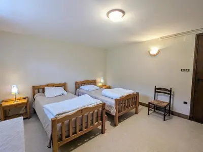 Un ou plusieurs lits dans un hébergement de l'établissement Gîte convivial à Xonrupt-Longemer, près du lac et des activités sportives, avec wifi et terrasse - FR-1-589-204