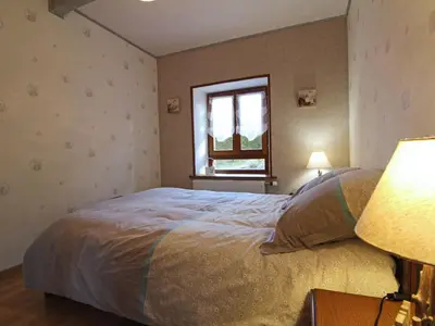 Un ou plusieurs lits dans un hébergement de l'établissement Gîte familial avec piscine, idéal pour randonnées et pêche, proche Gérardmer et crêtes vosgiennes - FR-1-589-238