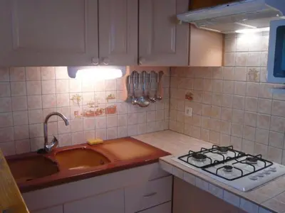 Cuisine ou kitchenette dans l'établissement Gîte spacieux avec terrasse et cheminée près de Saint-Dié, à 28 km de Gérardmer - FR-1-589-261