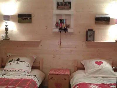 Un ou plusieurs lits dans un hébergement de l'établissement Chalet cosy proche de Gérardmer et Colmar - Nature, WIFI, 2 chambres, terrasse, garage - FR-1-589-306