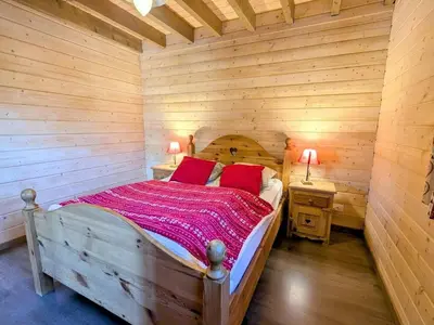 Un ou plusieurs lits dans un hébergement de l'établissement Chalet cosy à La Bresse avec WIFI et parking, proche pistes - FR-1-589-310