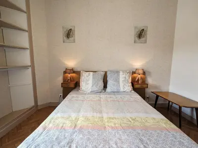 Un ou plusieurs lits dans un hébergement de l'établissement Gîte familial avec jardin, cheminée et parking à Jussarupt, près de Gérardmer - FR-1-589-320