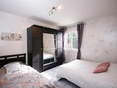 Un ou plusieurs lits dans un hébergement de l'établissement Ferme Vosgienne rénovée avec spa, sauna, jacuzzi, billard et étang privé en pleine nature - FR-1-589-327