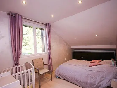 Un ou plusieurs lits dans un hébergement de l'établissement Ferme Vosgienne rénovée avec spa, sauna, jacuzzi, billard et étang privé en pleine nature - FR-1-589-327
