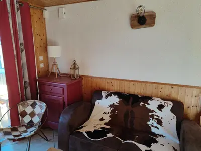 Coin salon dans l'établissement Maison indépendante avec jardin, terrasse et cheminée à Saulxures-sur-Moselotte - FR-1-589-339