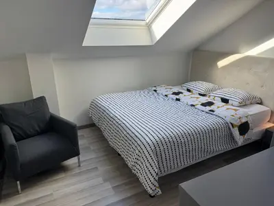Un ou plusieurs lits dans un hébergement de l'établissement Appartement Bes,, Attique neuf avec confort
