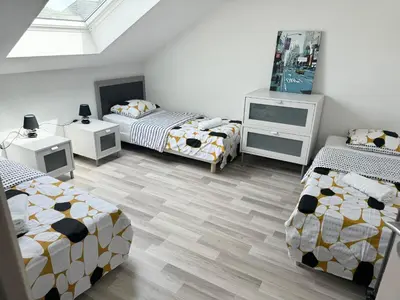 Un ou plusieurs lits dans un hébergement de l'établissement Appartement Bes,, Attique neuf avec confort