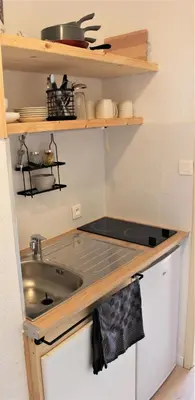 Cuisine ou kitchenette dans l'établissement Studio sous les pistes avec vue sur la vallée