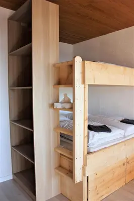 Un ou plusieurs lits dans un hébergement de l'établissement Studio sous les pistes avec vue sur la vallée