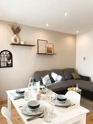 Coin salon dans l'établissement Appart'Hotel Le Tilleul - NETFLIX, JARDIN ET FIBRE OPTIQUE