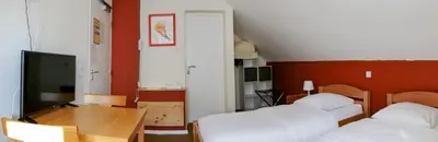 Un ou plusieurs lits dans un hébergement de l'établissement HOTEL RESTAURANT COLLIN