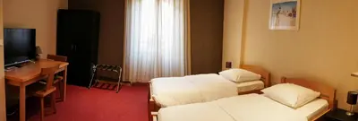 Télévision ou salle de divertissement dans l'établissement HOTEL RESTAURANT COLLIN