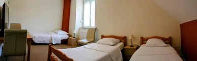 Un ou plusieurs lits dans un hébergement de l'établissement HOTEL RESTAURANT COLLIN
