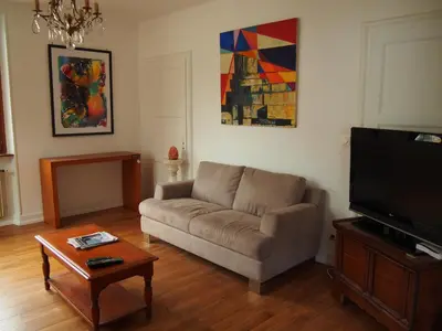 Télévision ou salle de divertissement dans l'établissement Gîte des Seigneurs 2