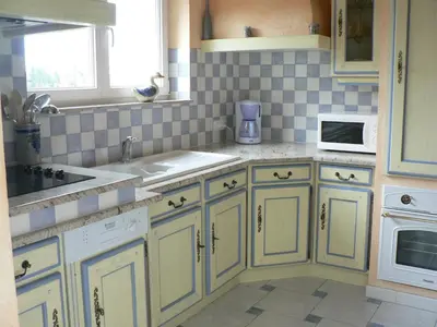 Cuisine ou kitchenette dans l'établissement Gite de la Lisière du Bois
