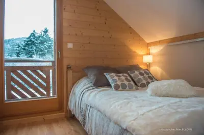 Un ou plusieurs lits dans un hébergement de l'établissement Chalet Charligustine - Gérardmer - 8p (4 étoiles)