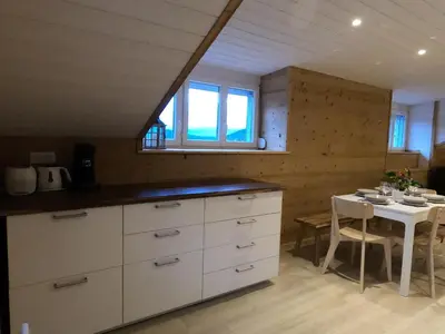 Cuisine ou kitchenette dans l'établissement Chez Léa et Lolo - L'Alpina