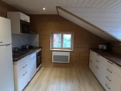 Cuisine ou kitchenette dans l'établissement Chez Léa et Lolo - L'Alpina
