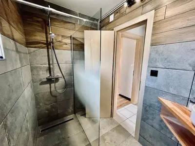 Salle de bains dans l'établissement La Perle de l'Eau - au bord du lac