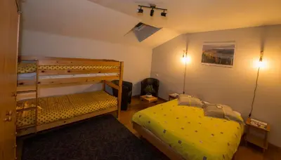 Un ou plusieurs lits dans un hébergement de l'établissement Le Cocon du Village Gérardmer