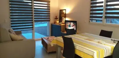 Un ou plusieurs lits dans un hébergement de l'établissement Les balcons la haie des grisselles