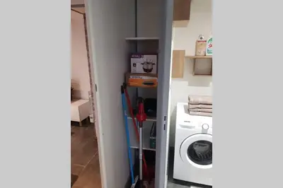 Cuisine ou kitchenette dans l'établissement Joli petit studio les brimbelles