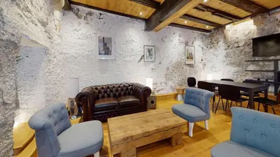Coin salon dans l'établissement Maison Le Clos Bartholdi