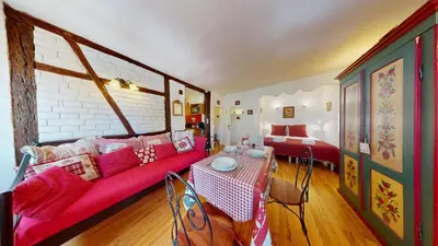 Coin salon dans l'établissement Maison Le Clos Bartholdi