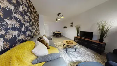 Télévision ou salle de divertissement dans l'établissement Appartement 2 chambres La Commanderie