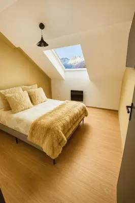 Un ou plusieurs lits dans un hébergement de l'établissement Ma Montagne Chic 2