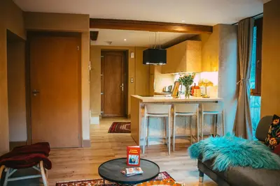 Coin salon dans l'établissement Le Grand Petit Prince - Domaine de Charme - Jacuzzis privatifs