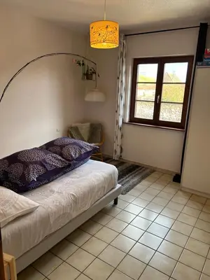 Un ou plusieurs lits dans un hébergement de l'établissement Charme,détente et vue imprenable en centre ville