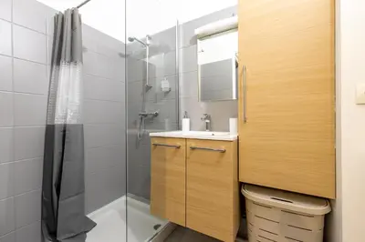 Salle de bains dans l'établissement Appart'Hôtel - Le Cocon de l'Est