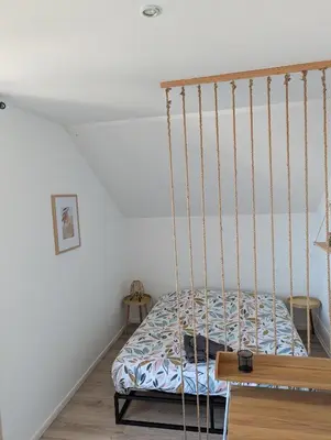 Un ou plusieurs lits dans un hébergement de l'établissement Appart'Hôtel Le Strasbourg - RENOVÉ, CALME ET NETFLIX