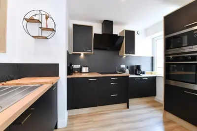 Cuisine ou kitchenette dans l'établissement Appartement L'Oriel avec Parking