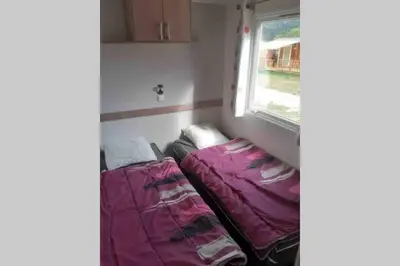 Un ou plusieurs lits dans un hébergement de l'établissement Mobil-Home 6 personnes à Munster en Alsace
