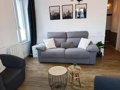 Coin salon dans l'établissement Le 1A, Charmant Appartement au Cœur de la Ville