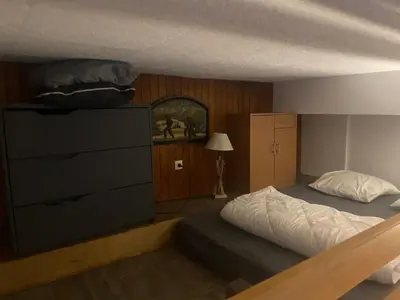 Un ou plusieurs lits dans un hébergement de l'établissement Résidence Belle Hutte 2