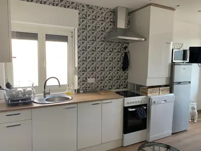 Cuisine ou kitchenette dans l'établissement Le cocon