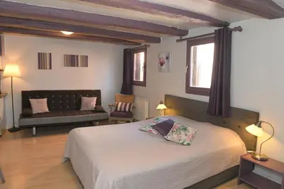 Un ou plusieurs lits dans un hébergement de l'établissement CHEZ CECILE Bed and Breakfast chez le VIGNERON