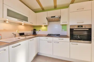 Cuisine ou kitchenette dans l'établissement Gîte -Coup de Cœur- 3 étoiles