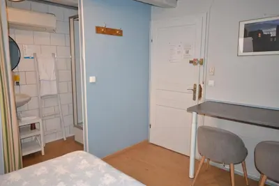 Un ou plusieurs lits dans un hébergement de l'établissement Chambres d'hôtes Chez Caroline