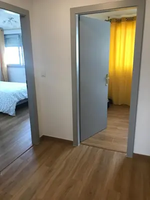 Un ou plusieurs lits dans un hébergement de l'établissement Sion City Mulhouse centre - parking et balcon-wifi 5G gratuit